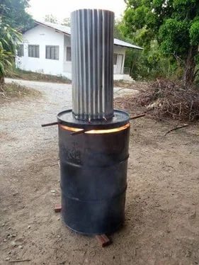 Top-Lit Updraft (TLUD) gasifier burning in a repurposed oil drum for smokeless biochar production